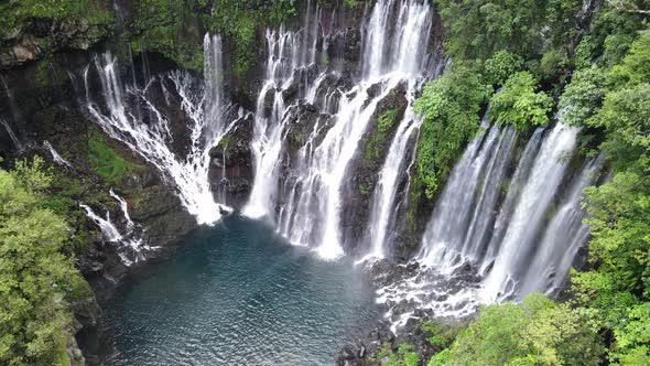 Top-down drone footage of the Langevin waterfall at the Reunion island. alt