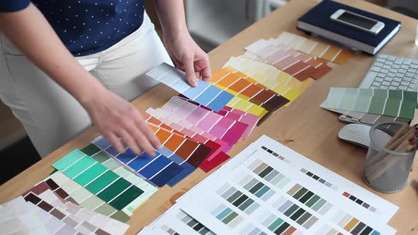Designer Chooses Best Color Samples for the Client