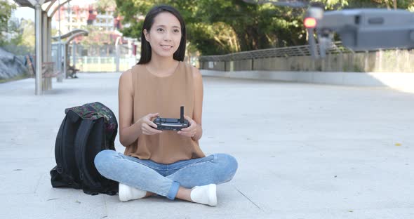 Woman control flying drone and accident occurs alt