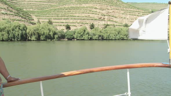 Mature woman on a boat holiday alt