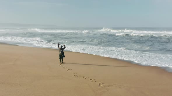 Coastal Area with Windy Weather and Foamy Waves Splashing Against the Shore alt