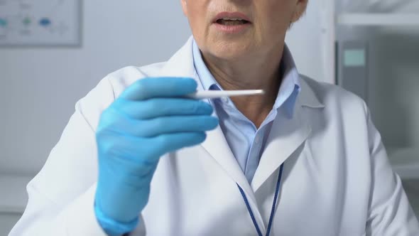 Unhappy Therapist Taking Thermometer From Patient and Shaking Head, Fever, POV