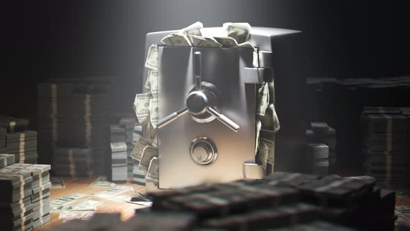Armored steel safe stuffed with money. Closed safe with stacks of money.