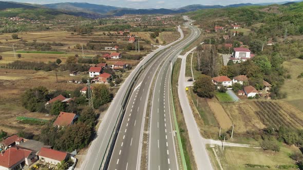 Highway low traffic rural southeast Europe. Aerial drone shot drone shot. Serbia