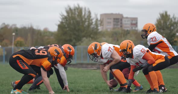 American Football Football Team in the Game Training Aggressive Opposition During the Game Battle of alt