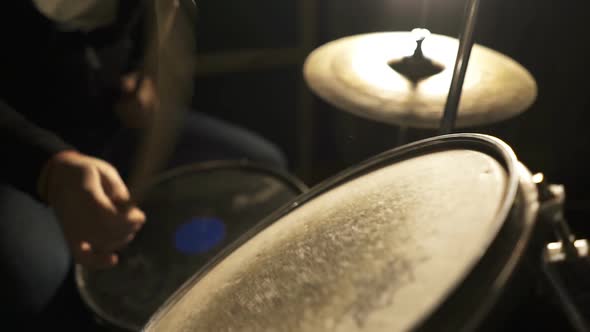 Musician is Playing the Drum Set in the Dark Clouded Studio