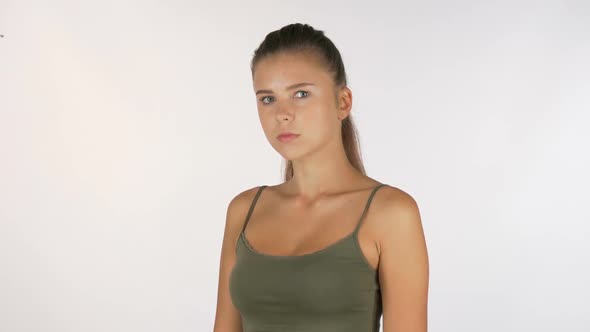 Young Woman Suffering From Elbow Injury, Looking To the Camera 1080p alt