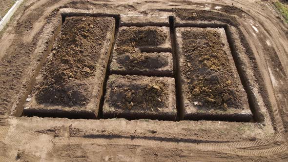 Dug Out Trench for Building Works of New House Concrete Foundation on Construction Site alt