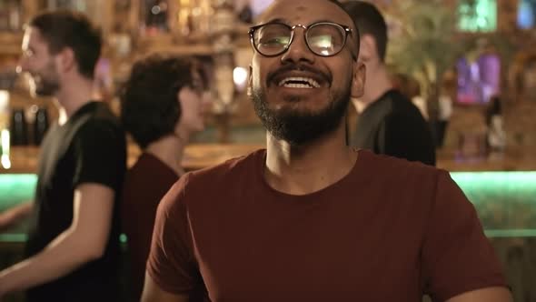 Portrait of Ecstatic Black Man Partying alt