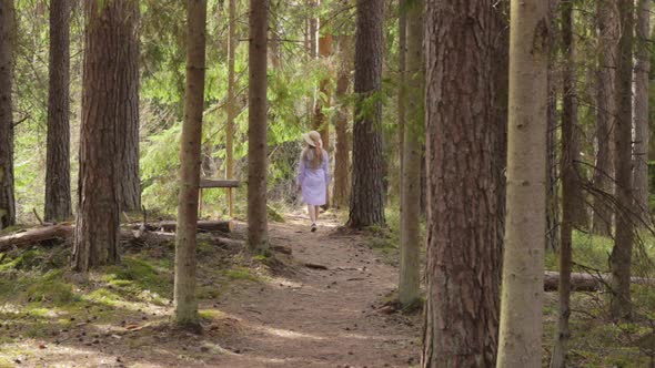 Spiritless bored maid searching for unexplored places in Danish woods alt