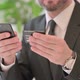 Close Up of Middle Aged Businessman Having Online Payment on Smartphone - VideoHive Item for Sale