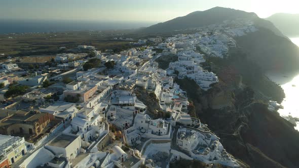Aerial View Flying Over City of Oia on Santorini Greece alt