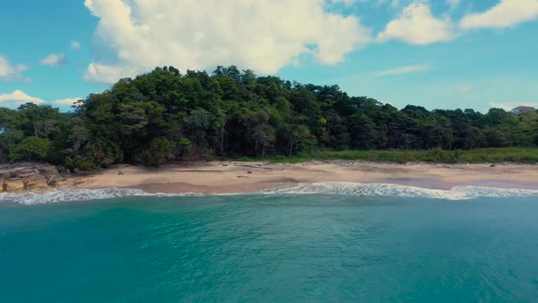 Drone footage of a wonderful island with a beautiful beach, lateral movement alt