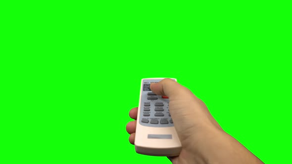 Hand Pushing Temperature Button on Air Conditioner Remote Control. Green Screen alt