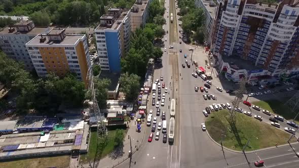 Wide Road with Tram Line in Modern City, Aerial Shot