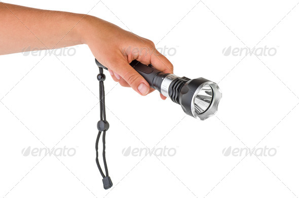 Hand hold powerful LED flashlight - Stock Photo - Images