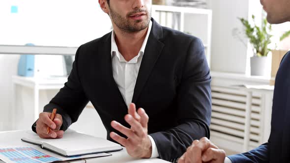 Colleagues Working Together in Office alt