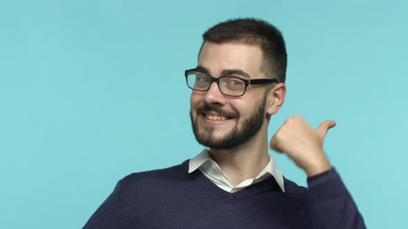 Close Up of Excited Bearded Guy in Glasses Jumping From Bottom with Thumbs Up Showing Approval and