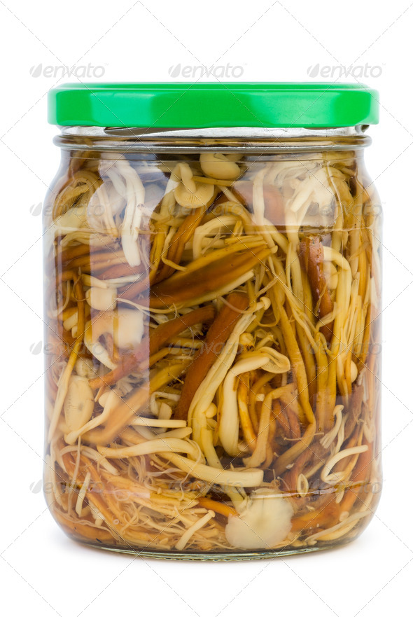 Glass jar with marinated enokitake mushrooms Stock Photo by digitalr