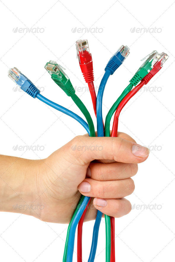 Bunch of different colored patch-cords gripped in fist