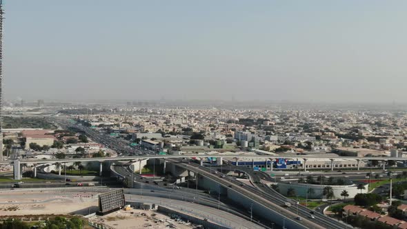 Aerial Footage of a Massive Multi Level Intersection on a Highway in Dubai alt