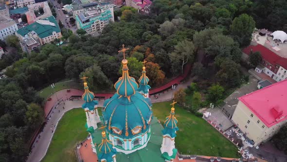 Aerial Top View of Saint Andrew's Church and Andreevska Street From Above in Kiev Ukraine. alt