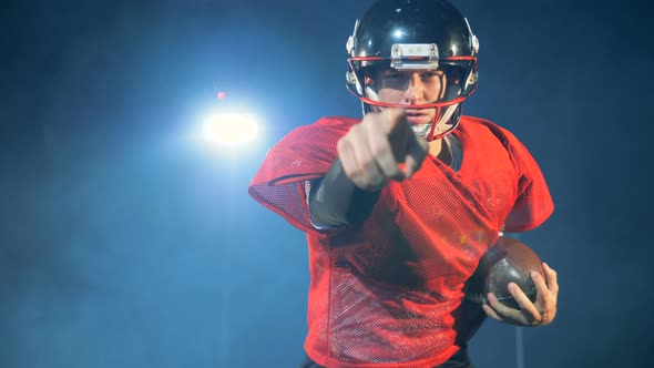 American Football Player Runs On A Light Background Close Up By Abc Video