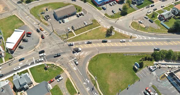 Major Asphalt Road with Multiple Lanes with a Traffic Light a Pedestrian Crossing Seen From Aerial alt