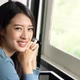 Beautiful portrait young asian woman sitting on chair by the window with smile. - VideoHive Item for Sale