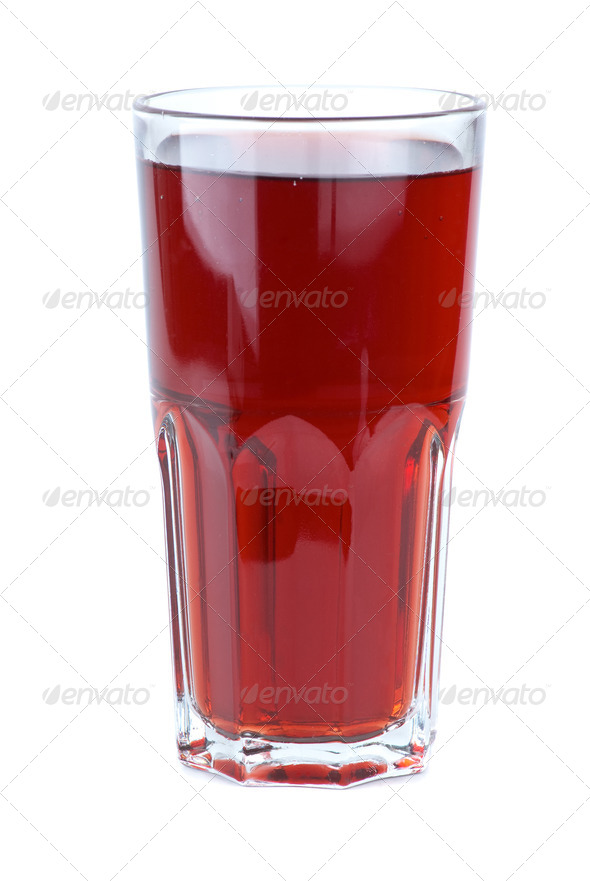 Glass filled with red pomegranate juice - Stock Photo - Images