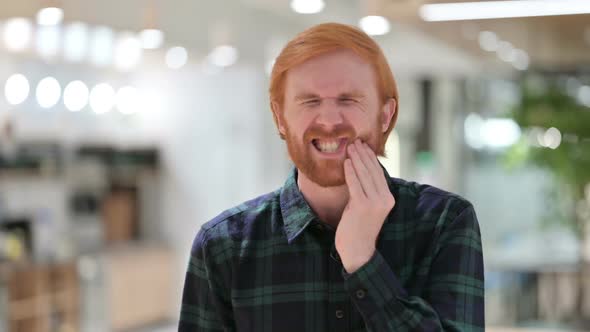 Portrait of Beard Redhead Man with Toothache Cavity alt