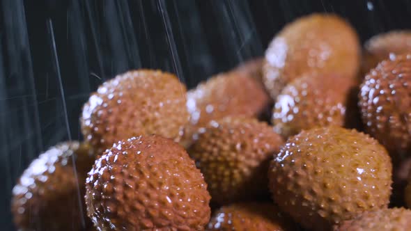 Splashes of Water Fall on Lychee alt