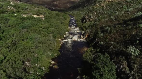 Aerial footage over the freestone streams in the Du Toitskloof mountains in the Western Cape of Sout alt