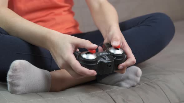 Joystick in child hands.  alt