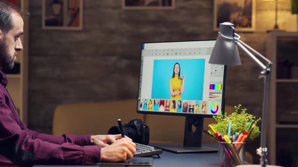 Digital Content Creator Retouching Photos for a Client alt