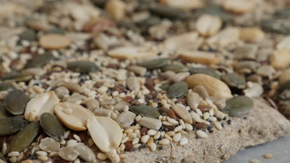 Whole integral wheat and mixed cereals  baked bread 4K 2160p 30fps UltraHD tilting footage - Chrono  alt