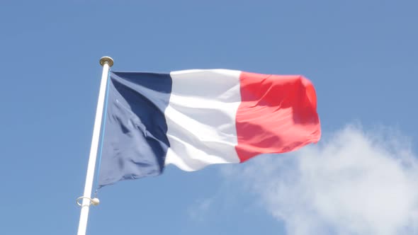 French flag  on the wind waving 4K 3840X2160 UltraHD footage - Flag of France  flowing against blue  alt