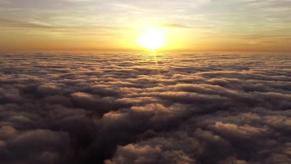 Flying Above The Clouds on Sunset
