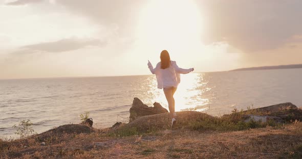 Freedom and Happiness Young Woman Joy at the Hill Above the Sea alt