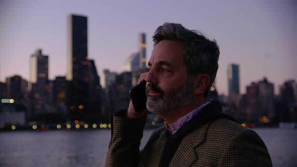 Man in New York City talking on cell phone