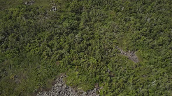 Aerial footage of White Cap Mountain situated within the watershed of the Pleasant River located in alt