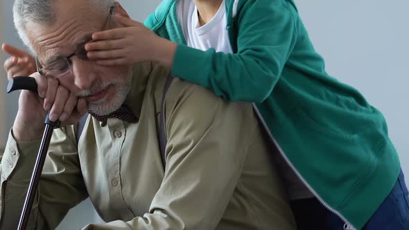 Boy Covering Grandfather Eyes Behind, Family Visit, Tender Relations Closeness