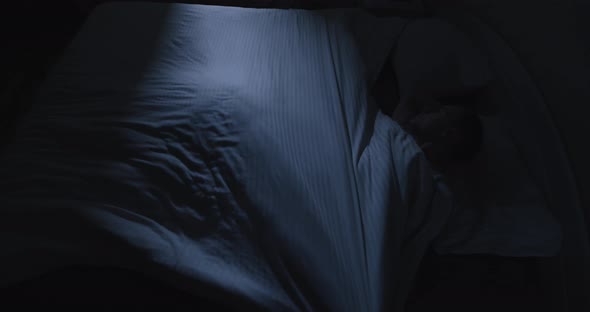 Man Tossing and Turning in Bed Cannot Sleep, Stock Footage | VideoHive