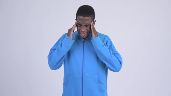 Young Stressed African Man Having Headache alt