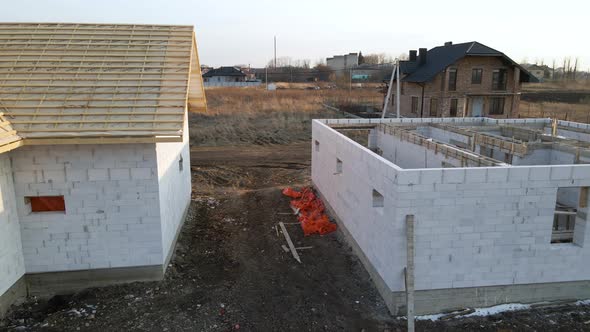 Aerial View of Unfinished Frame of Private House with Aerated Lightweight Concrete Walls and Wooden alt