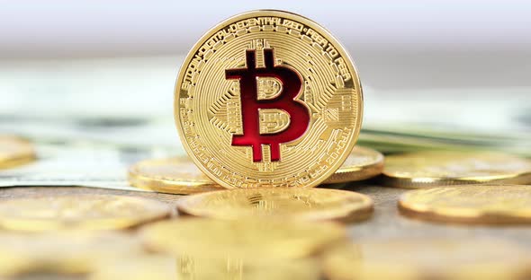 Coin approaching. The cryptocurrency Bitcoin coin. Gold coin.