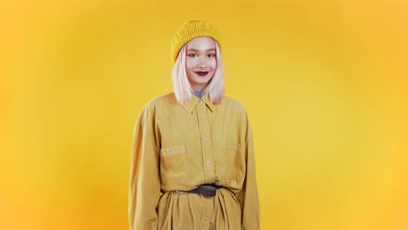 Young Curly Woman in Total Trendy Yellow Look. Portrait Flirting Beautiful Girl alt