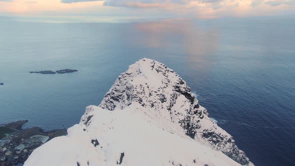 Drone Over Peak Of Snowy Mountain Reinebringen alt
