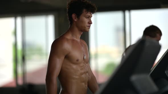 slow-motion shot, sporty people running on treadmill in gym, Good health lifestyle in city alt