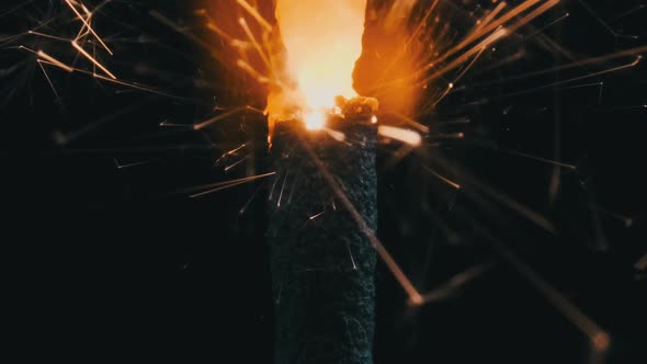 Sparkler on the Black Background in Slow Motion Macro Shot alt